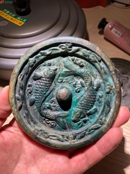 金代双鱼铜镜价格_金代双鱼铜镜真假辨别